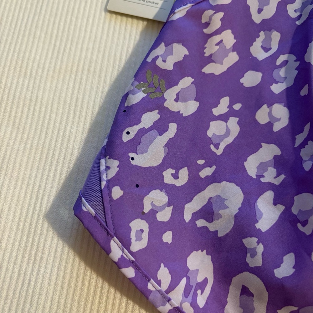All in Motion Mid-Rise Run Shorts Purple Leopard Zip Pocket Lined - Picture 5 of 8